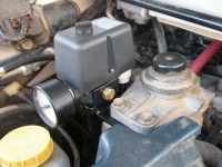 Pressure switch mounted to fuel filter.